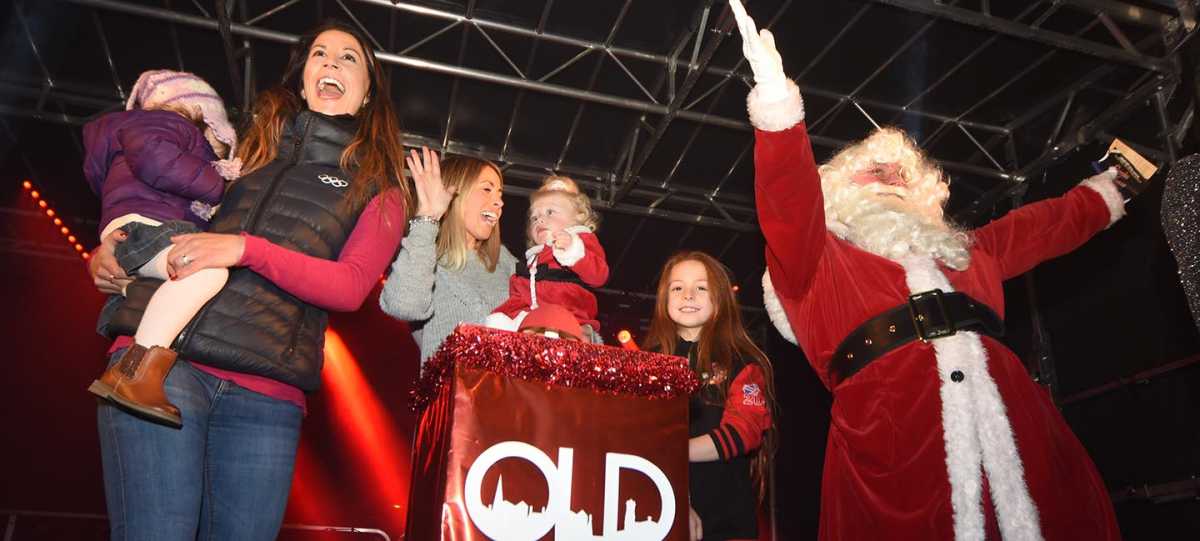 Olympic star turns on Old Town lights.